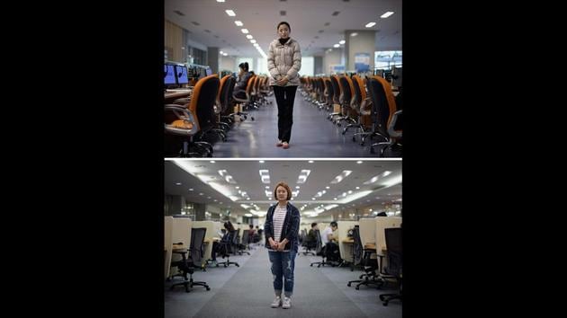 Volunteer staff member and student Ri Young Hwa (19, top) in a computer lab at the Scitech building in Pyongyang, and student Jenni Lim (21, bottom) at a computer lab at Yonsei University in Seoul. Jones said that the photographs are less about technical aspects of the picture and more about access. “It’s a rough style of photography which is more about the story of the two countries,” added Jones. (Ed Jones / AFP) Volunteer staff member and student Ri Young Hwa (19, top) in a computer lab at the Scitech building in Pyongyang, and student Jenni Lim (21, bottom) at a computer lab at Yonsei University in Seoul. Jones said that the photographs are less about technical aspects of the picture and more about access. “It’s a rough style of photography which is more about the story of the two countries,” added Jones. (Ed Jones / AFP)