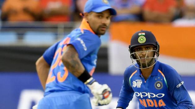 Indian batsman Shikhar Dhawan (L) and Ambati Rayudu runs between the wickets during the one day international (ODI) Asia Cup cricket match. (AFP)