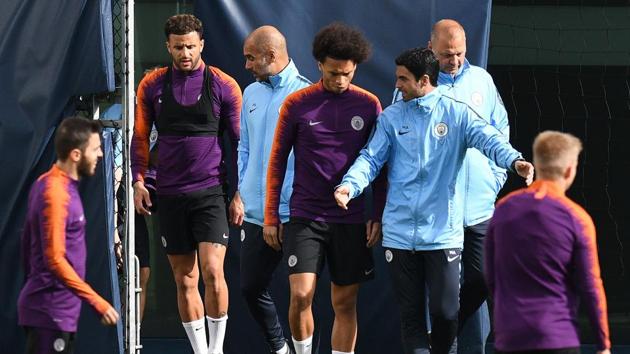 Manchester City's English defender Kyle Walker (2L), Manchester City's Spanish manager Pep Guardiola (C), Manchester City's German midfielder Leroy Sane (centre R), and Spanish assitant coach Mikel Arteta (3R) attend a training session at City Football Academy in Manchester (AFP) Manchester City's English defender Kyle Walker (2L), Manchester City's Spanish manager Pep Guardiola (C), Manchester City's German midfielder Leroy Sane (centre R), and Spanish assitant coach Mikel Arteta (3R) attend a training session at City Football Academy in Manchester (AFP)