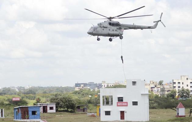 Troops of the Indian army demonstrate slithering during Milex 2018. (Ravindra Joshi/HT PHOTO) 