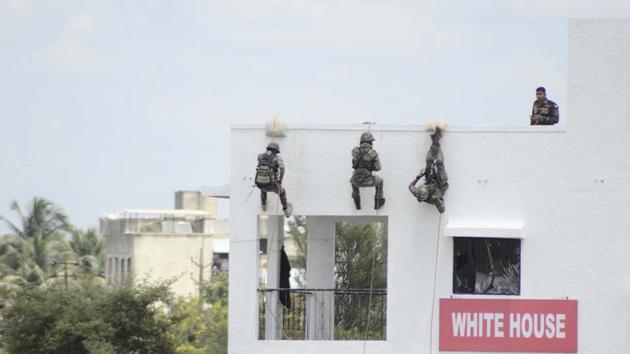 In a glimpse of what members of the contingents go through every day during the exercise, troops showcased room intervention operations, cordon and search operations (CASO) and tactical exercises on the ground like handling and neutralisation of improvised explosive devices (IEDs). (Ravindra Joshi/HT PHOTO) 