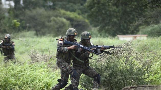 Troops of the Bhutanese army during a tactical drill at the Aundh Military Station in Pune. (Ravindra Joshi/HT PHOTO) 