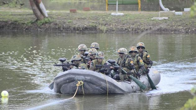 Troops practice precision shooting during the jungle lane shooting range exercise in Pune. (Ravindra Joshi/HT PHOTO) 