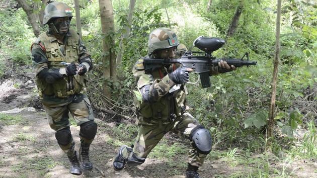 Troops shoot at targets during the jungle lane shooting range exercise at Milex 2018. (Ravindra Joshi/HT PHOTO) 