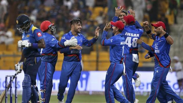 Afghanistan's Rashid Khan, third left, celebrates with teammates the dismissal of Sri Lanka's Shehan Jayasuriya. (AP) Afghanistan's Rashid Khan, third left, celebrates with teammates the dismissal of Sri Lanka's Shehan Jayasuriya. (AP)