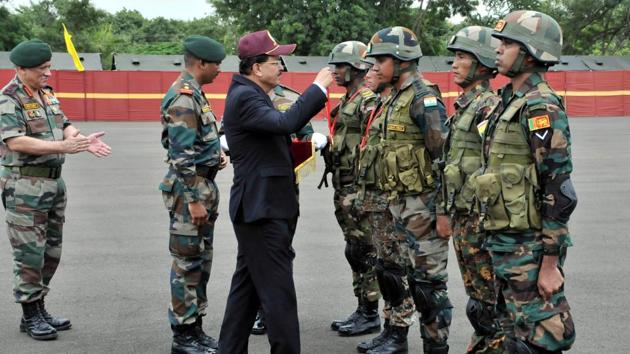 Minister of state for defence, Subhash Bhamre gives awards to the best troops from each of the participating contingents of various nations at Bimstec Milex 2018. (HT photo) 