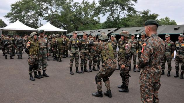 Troops take some time off to take photos with each other after the concluding ceremony of the Bimstec Milex 2018. (HT photo) 