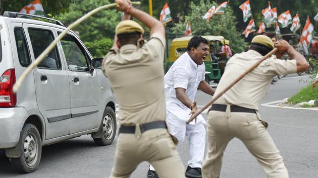 Congress activists said they were brutally cane-charged at the behest of the minister for protesting peacefully against him after he had allegedly referred to Congress as “garbage”. (PTI FILE PHOTO) Congress activists said they were brutally cane-charged at the behest of the minister for protesting peacefully against him after he had allegedly referred to Congress as “garbage”. (PTI FILE PHOTO)