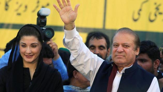 Nawaz Sharif (right), former Pakistani Prime Minister, gestures to supporters as his daughter Maryam Nawaz looks on during their party's workers convention in Islamabad on June 4, 2018.(Reuters/File Photo)
