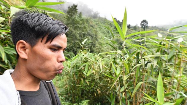 A villager whistles as he calls a friend in a field in Kongthong village, in the north-eastern state of Meghalaya. Everyone in this village, inhabited by the Khasi people, addresses each other with an individual little tune --and for a lifetime. They have conventional “real” names too, but they are rarely used. (Biju Boro / AFP) A villager whistles as he calls a friend in a field in Kongthong village, in the north-eastern state of Meghalaya. Everyone in this village, inhabited by the Khasi people, addresses each other with an individual little tune --and for a lifetime. They have conventional “real” names too, but they are rarely used. (Biju Boro / AFP)