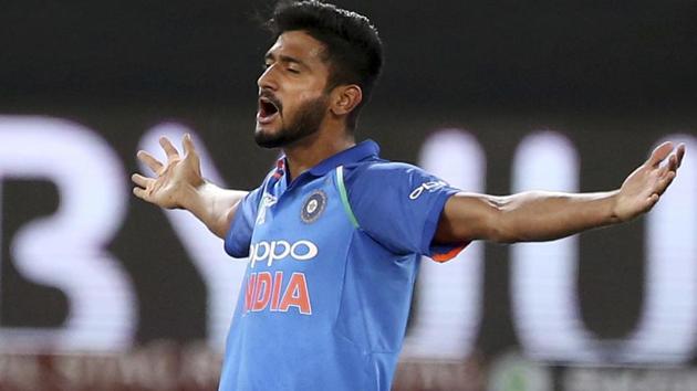 India's Khaleel Ahmed celebrates the dismissal of Hong Kong's Nizakat Khan during the one day international.M (AP)