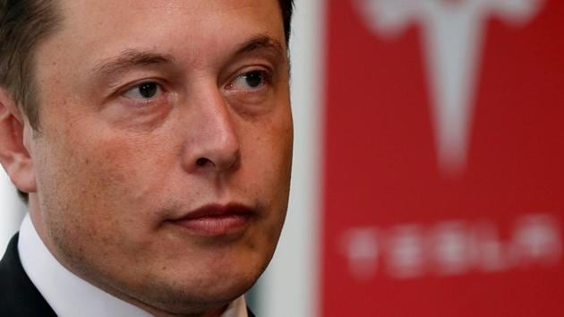 Tesla Inc. is under investigation by the justice department over public statements made by the company and chief executive officer Elon Musk, according to two people familiar with the matter. (Reuters File Photo)