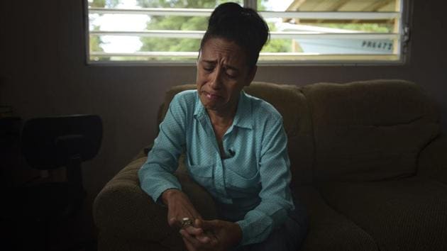Cruz cries as she denounces adverse conditions to which dialysis patients have been exposed. “Where is the conscience? Where is the humanity?” she asked, tearing up. “It’s always, ‘We don’t have the money, we don’t have the money, we don’t have the money.’ But they’re putting at risk lives that we could prolong.” (Carlos Giusti / AP) 