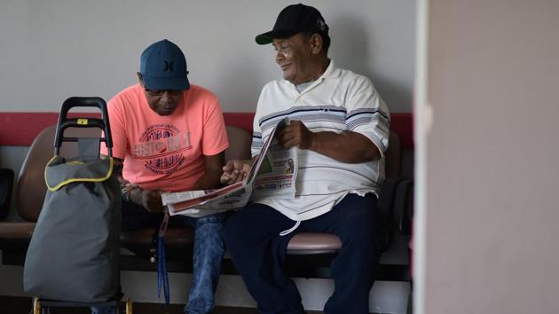 “You don’t get used to this,” chimed in Edwin Alvarado (R), a 59-year-old dialysis patient who also has high blood pressure and had an open heart surgery five months after Maria. Like Salgado, Alvarado said he’d love to move to the US mainland and closer to a dialysis clinic, but he has nowhere to stay and cannot afford to leave Vieques. (Carlos Giusti / AP) 