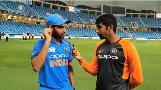Indian team’s Bhuvneshwar Kumar speaks with teammate Jasprit Bumrah after the team’s win over Pakistan in the Asia Cup. (Twitter/BCCI) Indian team’s Bhuvneshwar Kumar speaks with teammate Jasprit Bumrah after the team’s win over Pakistan in the Asia Cup. (Twitter/BCCI)