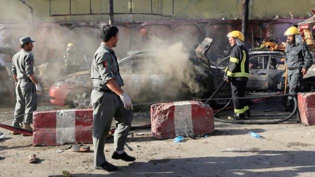 Afghan policemen inspect the site of a blast in Jalalabad city, Afghanistan on July 1. (Reuters) Afghan policemen inspect the site of a blast in Jalalabad city, Afghanistan on July 1. (Reuters)
