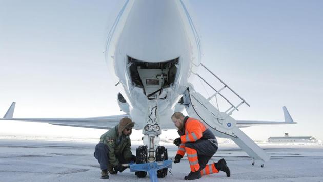 Airplane Mechanic, David Fuller (L), works with a local worker to move a NASA Gulfstream III before a flight to support a research mission. It was a poignant end to a months-long project examining climate change in Greenland. Scientists have had the computational power to understand global warming for only a few decades, and the numbers are sobering. But where does the data come from? (Lucas Jackson / REUTERS) Airplane Mechanic, David Fuller (L), works with a local worker to move a NASA Gulfstream III before a flight to support a research mission. It was a poignant end to a months-long project examining climate change in Greenland. Scientists have had the computational power to understand global warming for only a few decades, and the numbers are sobering. But where does the data come from? (Lucas Jackson / REUTERS)