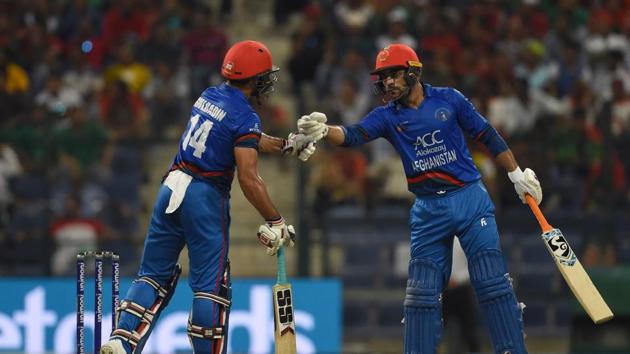 Afghan batsman Gulbadin Naib (L) and teammate Rashid Khan greet each other during the one day international (ODI) Asia Cup cricket match between Bangladesh and Afghanistan at the Sheikh Zayed Stadium in Abu Dhabi. (AFP) Afghan batsman Gulbadin Naib (L) and teammate Rashid Khan greet each other during the one day international (ODI) Asia Cup cricket match between Bangladesh and Afghanistan at the Sheikh Zayed Stadium in Abu Dhabi. (AFP)
