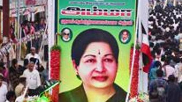 AIADMK cadres stage a 'silent rally' to observe the first death anniversary of J Jayalalithaa, at West Masi Street in Madurai, December. 2017.(PTI File Photo)