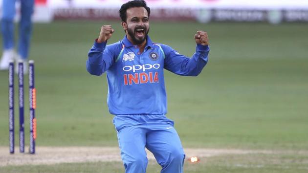 India's Kedar Jadhav celebrates the dismissal of Pakistan's Shoaib Malik. (AP)