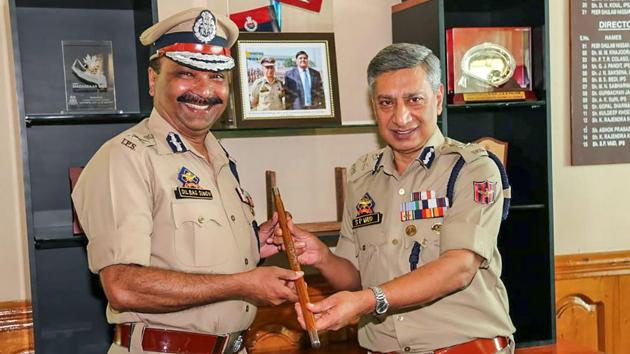 Dilbag Singh (L) receives the baton from former Director General of Police SP Vaid at Police Headquarters in Srinagar, on September 7, 2018. The Supreme Court on Thursday said the newly appointed acting Director General of Police (DGP) of Jammu and Kashmir shall continue in office till the Union Public Service Commission (UPSC) takes a decision on the matter. (PTI File) Dilbag Singh (L) receives the baton from former Director General of Police SP Vaid at Police Headquarters in Srinagar, on September 7, 2018. The Supreme Court on Thursday said the newly appointed acting Director General of Police (DGP) of Jammu and Kashmir shall continue in office till the Union Public Service Commission (UPSC) takes a decision on the matter. (PTI File)