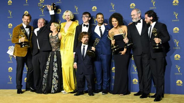 The cast of Game of Thrones pose with the Emmy for Outstanding Drama Series during the 70th Emmy Awards at the Microsoft Theatre in Los Angeles, California. (Valerie Macon / AFP)