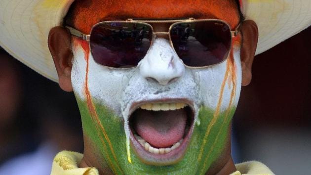 A fan cheers in support of his team during the one day international (ODI) Asia Cup cricket match between Pakistan and India at the Dubai International Cricket Stadium in Dubai on September 19, 2018. (Ishara S. Kodikara / AFP) A fan cheers in support of his team during the one day international (ODI) Asia Cup cricket match between Pakistan and India at the Dubai International Cricket Stadium in Dubai on September 19, 2018. (Ishara S. Kodikara / AFP)