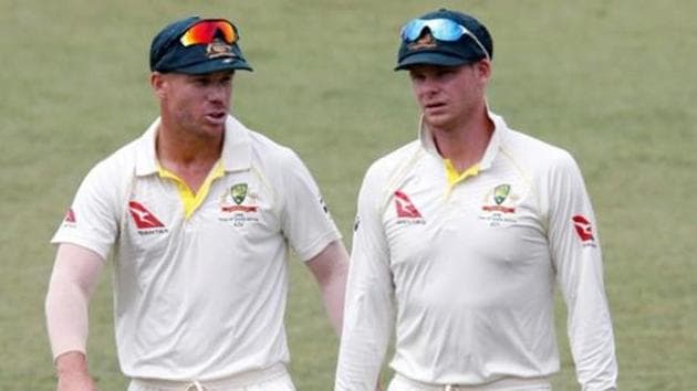 Cricket - South Africa vs Australia - First Test Match - Kingsmead Stadium, Durban, South Africa - March 5, 2018. Australia's David Warner and Steve Smith leave the pitch after beating South Africa. REUTERS/Rogan Ward/Files Cricket - South Africa vs Australia - First Test Match - Kingsmead Stadium, Durban, South Africa - March 5, 2018. Australia's David Warner and Steve Smith leave the pitch after beating South Africa. REUTERS/Rogan Ward/Files