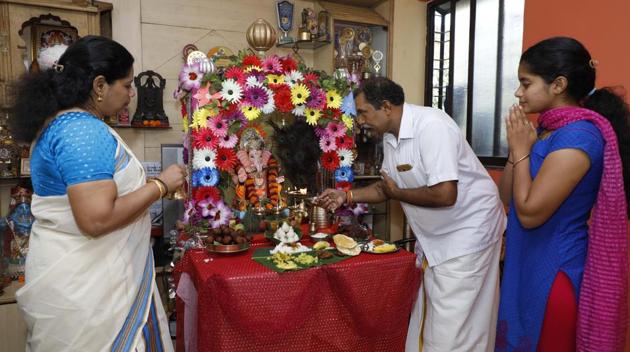 The Nair family start Ganesh puja with the traditional Malayali suprabtham (morning) puja. (HT PHOTO) The Nair family start Ganesh puja with the traditional Malayali suprabtham (morning) puja. (HT PHOTO)