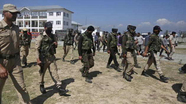 Shortly after the bodies of three policemen killed by militants were found in south Kashmir’s Shopian today, several videos emerged on social media that purportedly show special police officers announcing their decision to resign. A senior Kashmir police officer said they are yet to authenticate the claims being made in the video messages. At least six such messages have emerged and are being circulated widely. (Mukhtar Khan / AP) Shortly after the bodies of three policemen killed by militants were found in south Kashmir’s Shopian today, several videos emerged on social media that purportedly show special police officers announcing their decision to resign. A senior Kashmir police officer said they are yet to authenticate the claims being made in the video messages. At least six such messages have emerged and are being circulated widely. (Mukhtar Khan / AP)