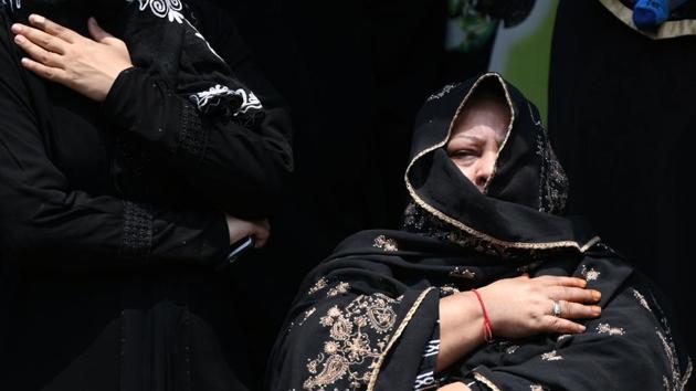 Shiite Muslim women mourn as they watch a religious procession on the tenth day of the Islamic month of Muharram, which marks the day of Ashura and the martyrdom at Karbala of Hussain ibn Ali, the grandson of the prophet Muhammad, in Chennai. (Arun Sankar / AFP) Shiite Muslim women mourn as they watch a religious procession on the tenth day of the Islamic month of Muharram, which marks the day of Ashura and the martyrdom at Karbala of Hussain ibn Ali, the grandson of the prophet Muhammad, in Chennai. (Arun Sankar / AFP)