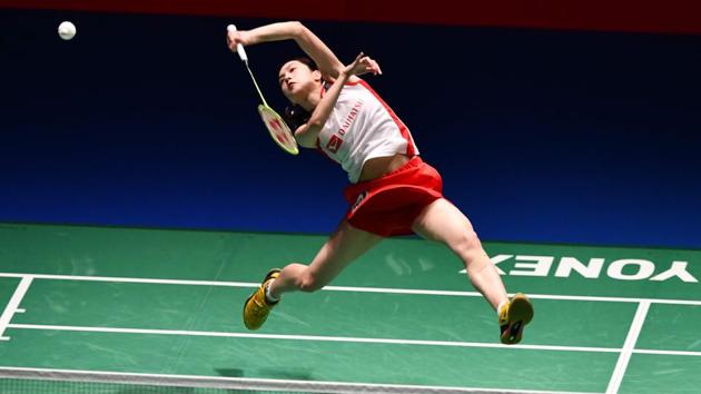 Japan’s Aya Ohori returns a shot against her compatriot Nozomi Okuhara during the women’s semi-final match at the Japan Open Badminton Championships in Tokyo. (Kazuhiro Nogi / AFP)