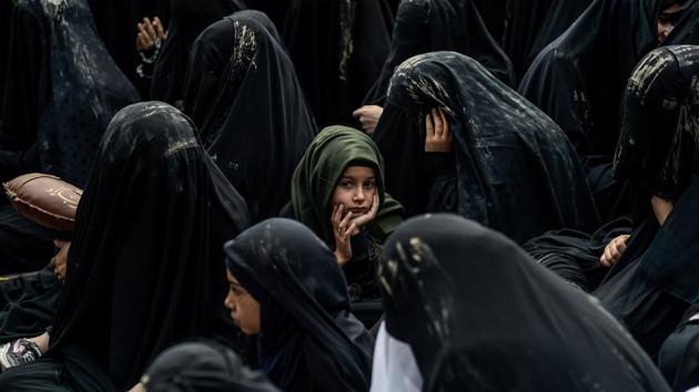 Turkish Shiite women take part in a religious procession held for the Shiite religious holiday of Ashura in Istanbul. (Yasin Akgul / AFP)
