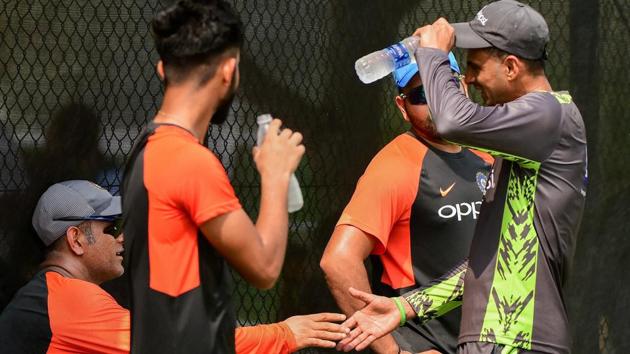 MS Dhoni meets Pakistani cricketer Shoaib during net practice ahead of Asia Cup 2018.(PTI)