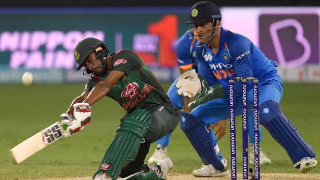 Bangladesh batsman Mehidy Hasan Miraz (L) plays a shot against India. (AFP)