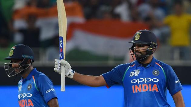 Indian Cricket team captain Rohit Sharma (R) celebrates after scoring a half-century (50 runs) as Ambati Rayudu (L) looks on during the one day international (ODI) Asia Cup cricket match between Bangladesh and India at the Dubai International Cricket Stadium in Dubai on September 21, 2018 (AFP) Indian Cricket team captain Rohit Sharma (R) celebrates after scoring a half-century (50 runs) as Ambati Rayudu (L) looks on during the one day international (ODI) Asia Cup cricket match between Bangladesh and India at the Dubai International Cricket Stadium in Dubai on September 21, 2018 (AFP)