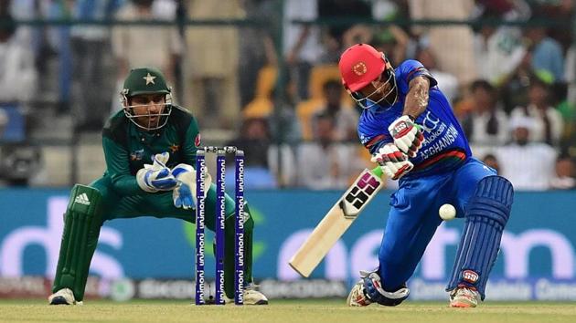 Afghanistan team captain and batsman Mohammad Asghar plays a shot during the one day international. (AFP)