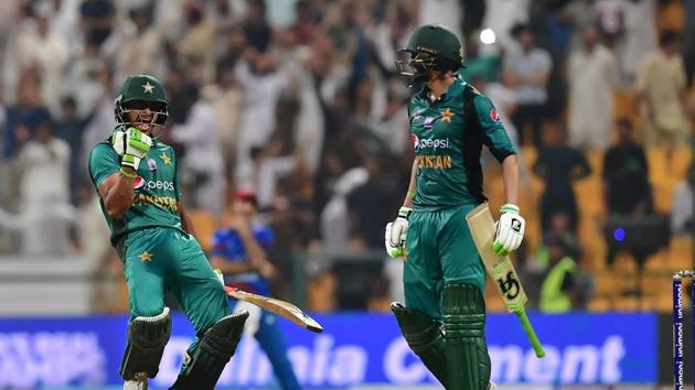 Pakistan's Hasan Ali (L) celebrates with Shoaib Malik at the end of the match during the one day international. (AFP)