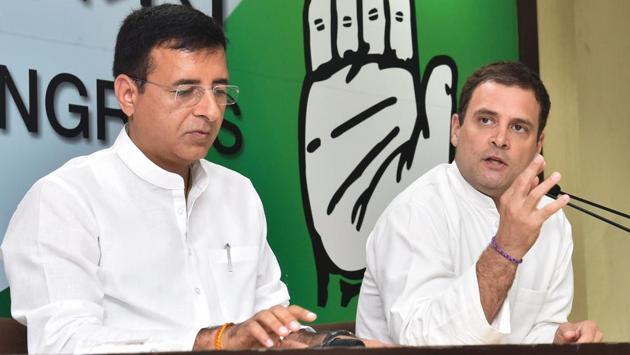 Congress President Rahul Gandhi with party spokesperson Randeep Surjewala addresses the media on Rafale deal issue, in New Delhi, Saturday, Sep 22, 2018.(PTI)