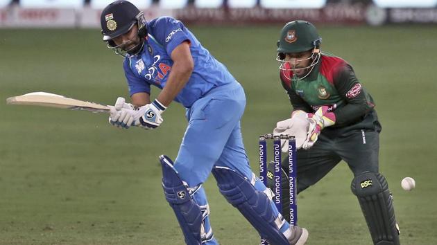 India's captain Rohit Sharma, left, bats during the ODI encounter against Bangladesh. (AP)