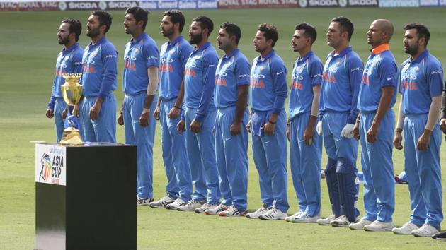 Members of Indian team stand for their national anthem before the start of the match. (AP)