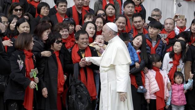 Pope Francis meets a group of faithful from China at the end of his weekly general audience in St. Peter's Square, at the Vatican. (AP File Photo) Pope Francis meets a group of faithful from China at the end of his weekly general audience in St. Peter's Square, at the Vatican. (AP File Photo)