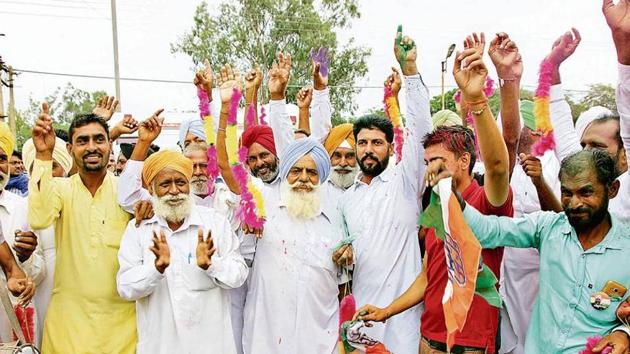 As the Congress registered victory in majority of zones of block samiti and zila parishad polls, party workers celebrating outside the counting centre in Bathinda on Saturday. (HT Photo) As the Congress registered victory in majority of zones of block samiti and zila parishad polls, party workers celebrating outside the counting centre in Bathinda on Saturday. (HT Photo)