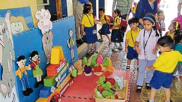 Preschools under the Podar Jumbo Kids umbrella encourage students to play games on nutrition.(HT PHOTO)