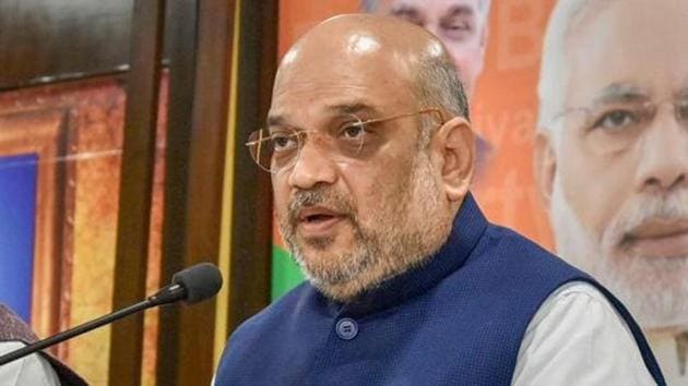 BJP chief Amit Shah Sunday said his party will seek to identify illegal immigrants living in the country if it comes to power after the Lok Sabha polls. (PTI File Photo) BJP chief Amit Shah Sunday said his party will seek to identify illegal immigrants living in the country if it comes to power after the Lok Sabha polls. (PTI File Photo)