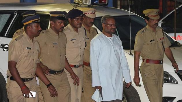 Bishop Franco Mulakkal (second right), accused of raping a nun, is escorted by police outside a crime branch office on the outskirts of Kochi in Kerala. (Reuters File Photo)