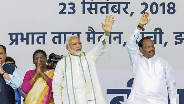 Prime Minister Narendra Modi with and Jharkhand chief minister Raghubar Das wave at their supporters during the launch of Ayushman Bharat-National Health Protection Mission (AB-NHPM) , in Ranchi. (PTI File Photo) Prime Minister Narendra Modi with and Jharkhand chief minister Raghubar Das wave at their supporters during the launch of Ayushman Bharat-National Health Protection Mission (AB-NHPM) , in Ranchi. (PTI File Photo)