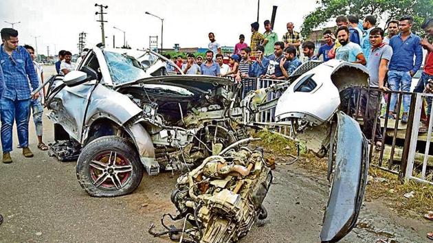 The mangled remains of the car that met with an accident at Karabara Chowk near Basti Jodhewal in Ludhiana.(HT Photo)