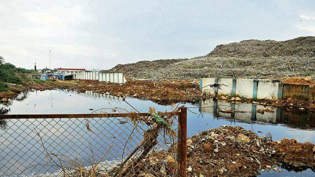 Leachate run-off from the Bandhwari landfill is believed to have contaminated the groundwater resources in the area, posing a grave risk to residents and the surroundings. (HT Photo) Leachate run-off from the Bandhwari landfill is believed to have contaminated the groundwater resources in the area, posing a grave risk to residents and the surroundings. (HT Photo)