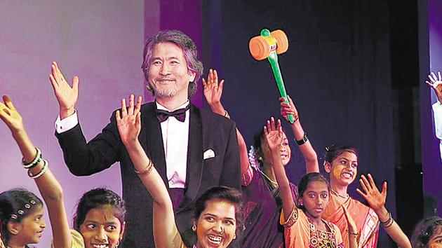 Jaechang Kim with children of the Banana choir. (HT PHOTO)